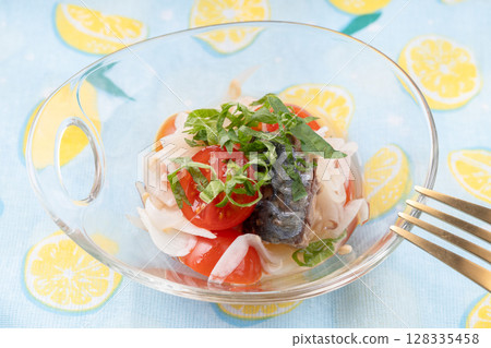 Canned mackerel, cherry tomatoes and new onions in sweet and sour sauce Canned mackerel, cherry tomatoes and new onions in sweet and sour sauce 128335458