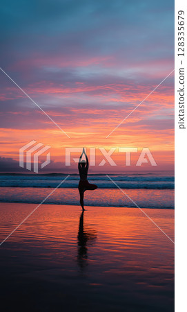 Person practicing yoga on beach at sunrise, calm ocean, colorful sky, peaceful reflection Person practicing yoga on beach at sunrise, calm ocean, colorful sky, peaceful reflection 128335679