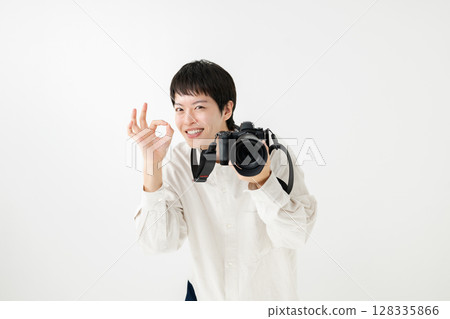 A man with a camera A man with a camera 128335866