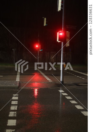 A street with two traffic lights that are red A street with two traffic lights that are red 128336631