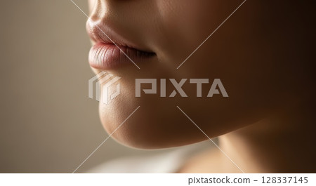 Soft Focus Close Up of Young Womans Lips and Chin with Natural Skin Texture Soft Focus Close Up of Young Womans Lips and Chin with Natural Skin Texture 128337145