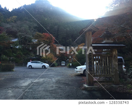 A temple surrounded by autumn leaves 128338743