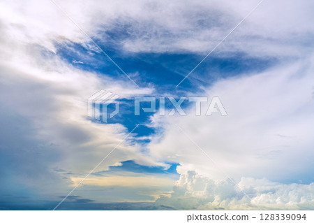 Yokohama cityscape in Japan, with a view of the majestic cumulus clouds (bottom right of the screen) shining against the blue sky (July 10th) Yokohama cityscape in Japan, with a view of the majestic cumulus clouds (bottom right of the screen) shining against the blue sky (July 10th) 128339094