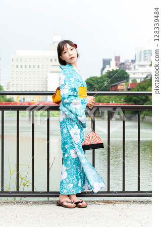 Japanese woman in yukata Japanese woman in yukata 128339484