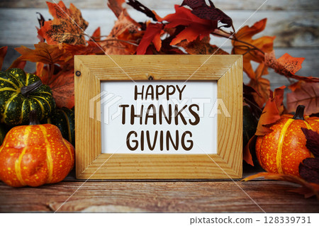 Thankful, Grateful, Blessed text with maple leaf decoration on wooden background Thankful, Grateful, Blessed text with maple leaf decoration on wooden background 128339731