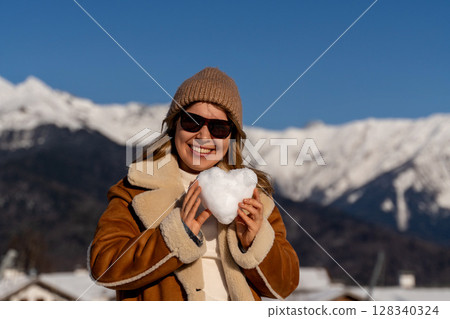 Snow Heart Woman Mountains: Winter Romance, Alps, Snowball Happiness Snow Heart Woman Mountains: Winter Romance, Alps, Snowball Happiness 128340324