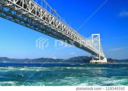 [Tokushima Prefecture] Onaruto Bridge and Whirlpools (Naruto Whirlpools) seen from a sightseeing boat 128340392