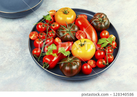 Tomatoes of different varieties Tomatoes of different varieties 128340586