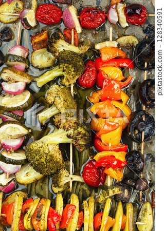 Grilled roasted vegetable kebabs. 128340591