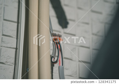 Air conditioner installation Air conditioner installation 128341175