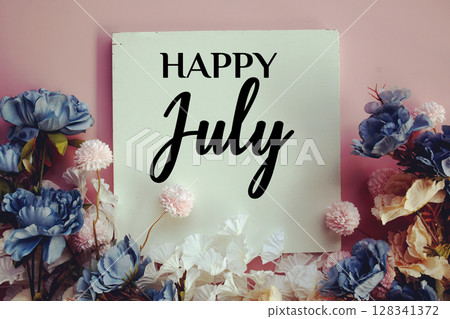 Happy July text with flowers decorations on pink background 128341372