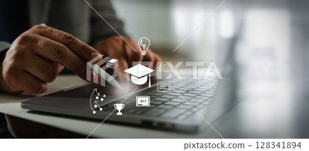 Student success person using stylus laptop with digital icons related to education and learning floating above keyboard, symbolizing online 128341894