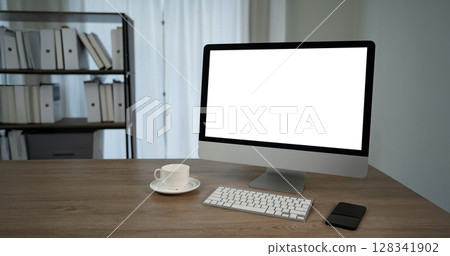 Computer with blank screen on table Modern workspace with sleek computer, keyboard, smartphone, and coffee cup wooden desk, creating professional Computer with blank screen on table Modern workspace with sleek computer, keyboard, smartphone, and coffee cup wooden desk, creating professional 128341902