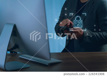 Data protection privacy person business suit using smartphone with digital lock icons and security graphics overlayed, indicating cybersecurity 128341906