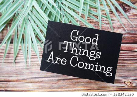 Good Things Are Coming Motivational and Inspirational quotes on wooen background 128342180