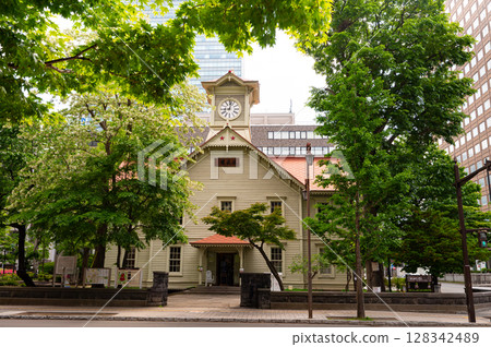 Sapporo's landmark: the clock tower surrounded by fresh greenery 128342489