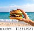 Hamburger on the beach in summer 128343021