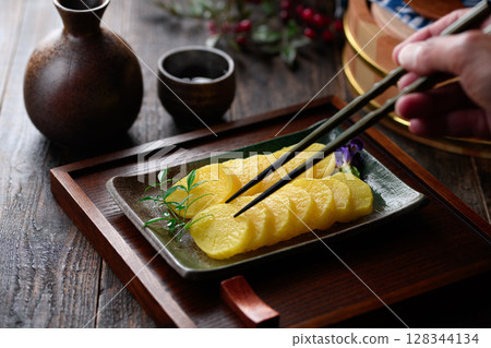A great supporting role in Japanese cuisine: elegantly arranged slices of pickled radish 128344134