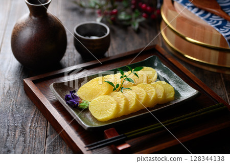 A great supporting role in Japanese cuisine: elegantly arranged slices of pickled radish A great supporting role in Japanese cuisine: elegantly arranged slices of pickled radish 128344138