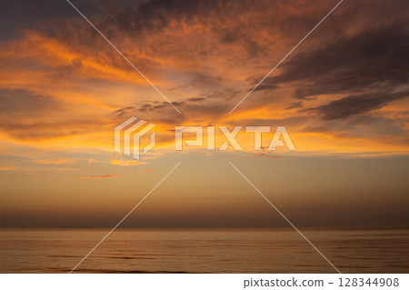 Cloudy summer sunset, Acharavi, Corfu, Greece 128344908