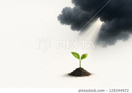 The sprout makes its way through the darkness to the light. Space for text. 128344972