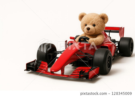 Mishka at the wheel of a racing car. Space for text. Mishka at the wheel of a racing car. Space for text. 128345009