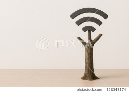 Tree in the form of a Wi-Fi antenna, a connection between nature and technology. Space for text. 128345174