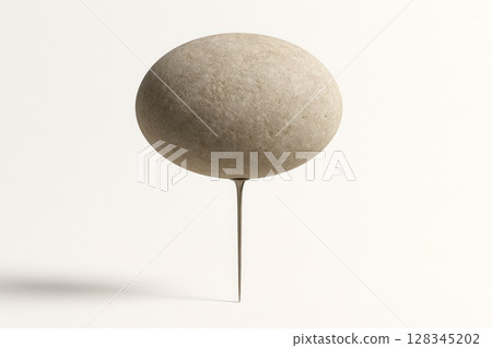 A large rock balances on a sharp metal spike. A large rock balances on a sharp metal spike. 128345202