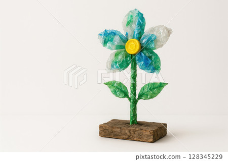 A flower made from plastic waste. Space for text. 128345229