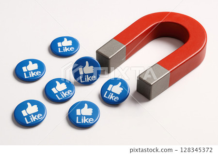 Magnet that attracts likes on a light background. 128345372