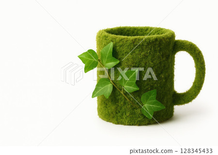 A mug covered with moss, with a climbing plant. Space for text. 128345433