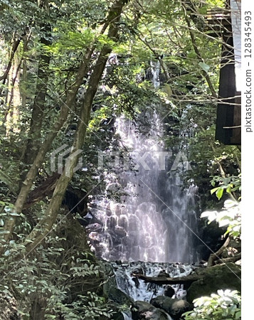 Small beautiful waterfall 128345493