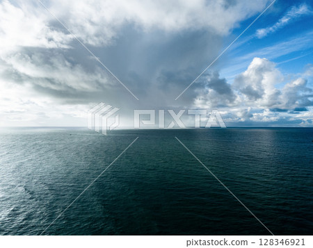 Clouds over the blue Ocean Clouds over the blue Ocean 128346921