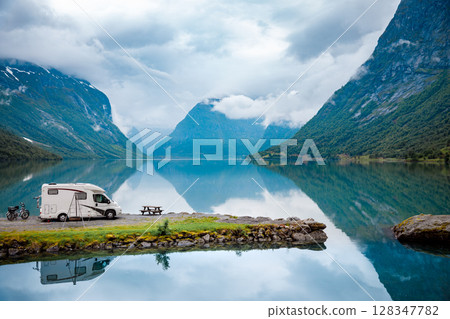Family vacation travel RV, holiday trip in motorhome, Caravan car Vacation. 128347782