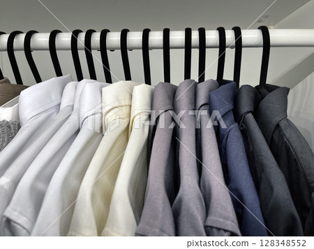Close up shirts or business clothes on hangers Close up shirts or business clothes on hangers 128348552