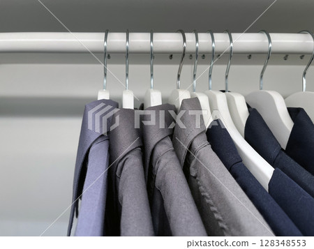 Close up shirts or business clothes on hangers 128348553