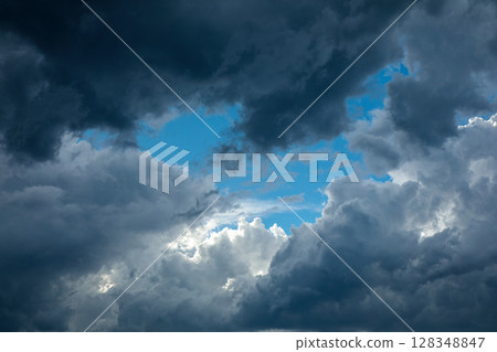 Rain clouds approaching 128348847