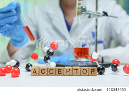 Conducting a detailed chemical experiment on the acceptor concept in a controlled lab setting 128348963