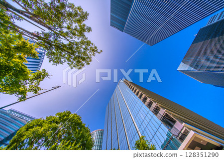 Yokohama cityscape in Japan in July. View of skyscrapers in front of Shin-Takashima Station (9th) Yokohama cityscape in Japan in July. View of skyscrapers in front of Shin-Takashima Station (9th) 128351290