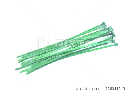 green plastic twist belt for roll oblect arranging isolated on white background 128351343