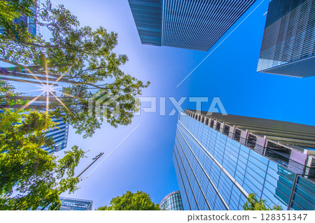 Yokohama cityscape in Japan in July. View of skyscrapers in front of Shin-Takashima Station (9th) 128351347