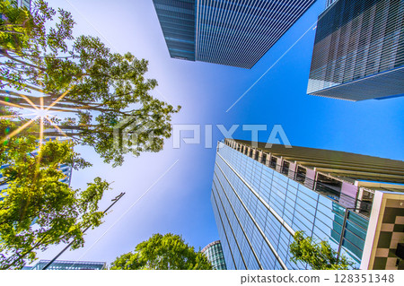 Yokohama cityscape in Japan in July. View of skyscrapers in front of Shin-Takashima Station (9th) 128351348