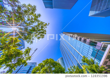 Yokohama cityscape in Japan in July. View of skyscrapers in front of Shin-Takashima Station (9th) Yokohama cityscape in Japan in July. View of skyscrapers in front of Shin-Takashima Station (9th) 128351396
