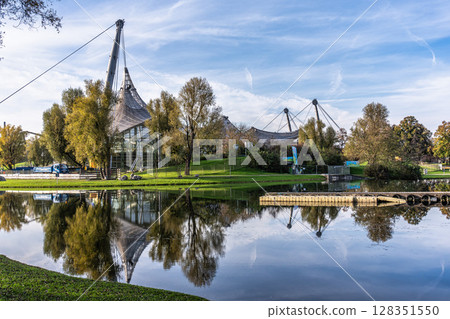 Golden autumn view in the Olympiapark in Munich, Germany, an Olympic Park for the 1972 Summer Olympics 128351550