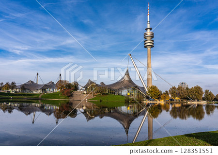 Golden autumn view in the Olympiapark in Munich, Germany, an Olympic Park for the 1972 Summer Olympics Golden autumn view in the Olympiapark in Munich, Germany, an Olympic Park for the 1972 Summer Olympics 128351551