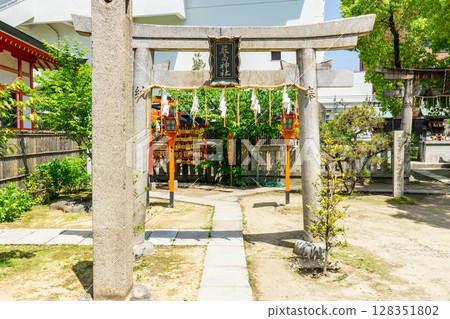 Torii gate at Tamatsukuri Inari Shrine and Itsukushima Shrine in Tamatsukuri, Chuo Ward, Osaka City Torii gate at Tamatsukuri Inari Shrine and Itsukushima Shrine in Tamatsukuri, Chuo Ward, Osaka City 128351802