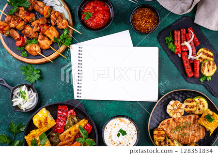 Assortment of grilled bbq meat and vegetables 128351834