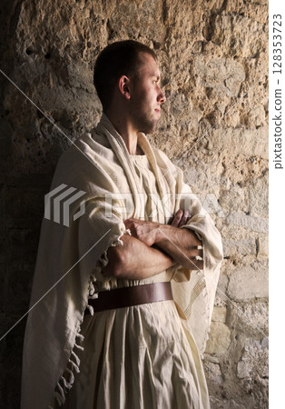 Ancient man at the window Ancient man at the window 128353723