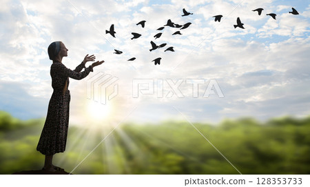 Young girl praying to God 128353733