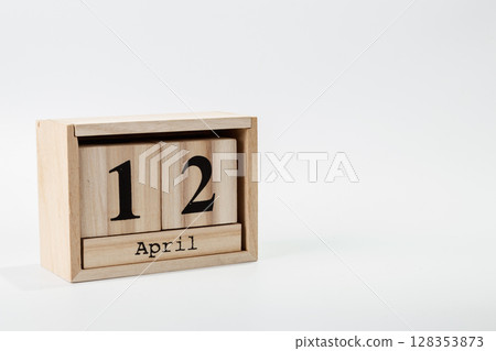 Wooden calendar April 12 on a white background 128353873